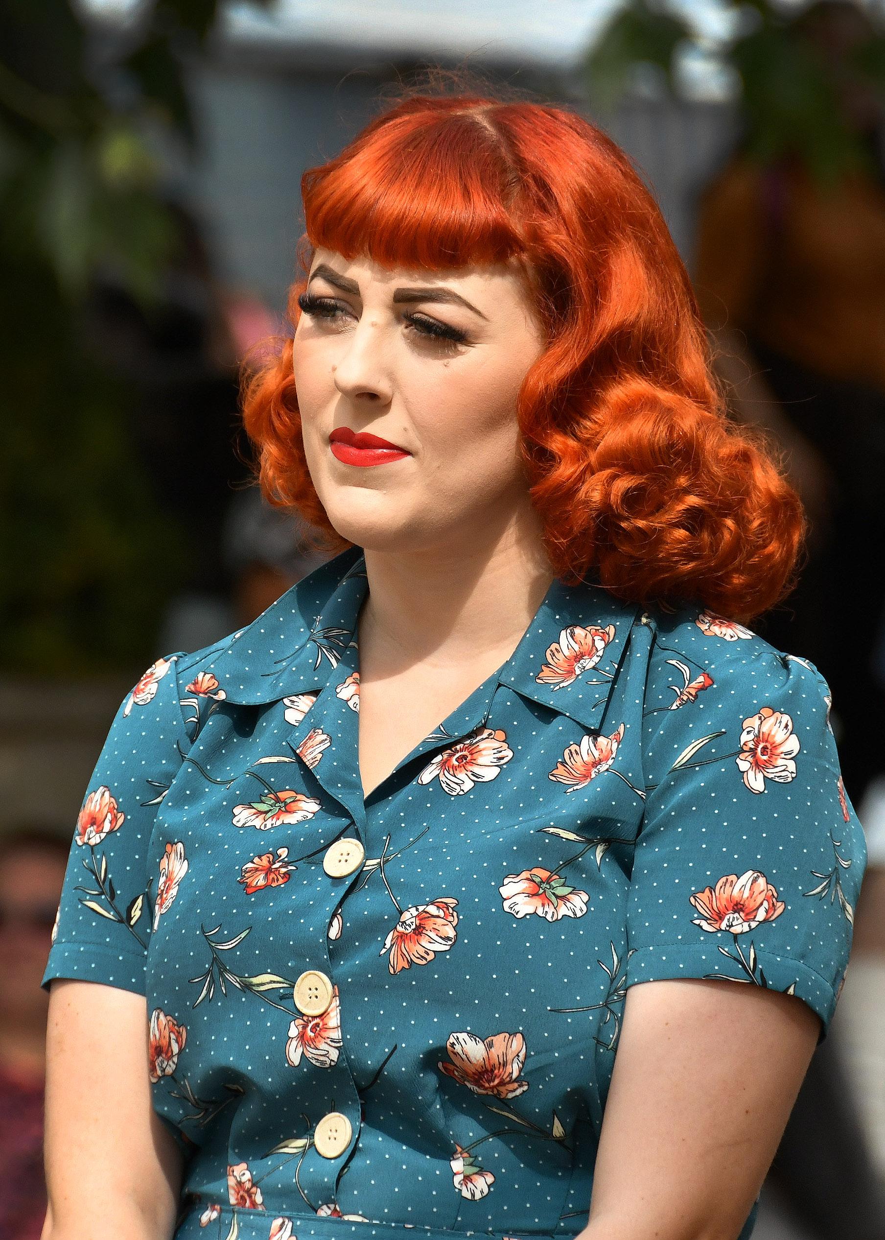 Woman dressed in vintage 1940s attire