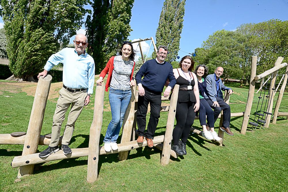 Councillors and members of the LLRA stood on Whitton Park play equipment