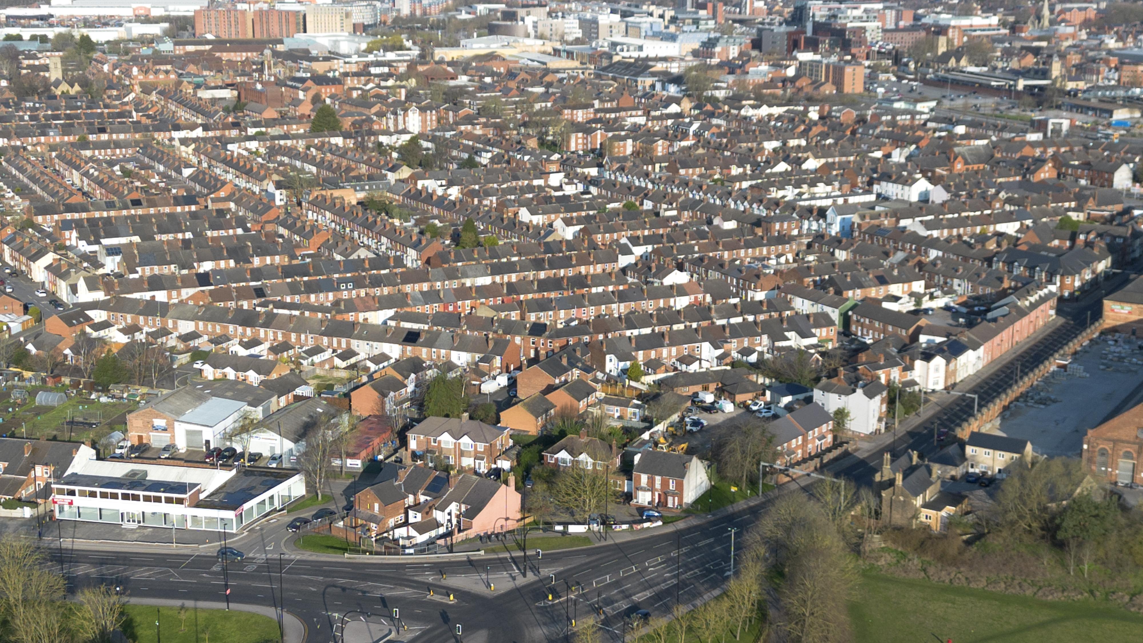 A drone picture of lots of terraced houses.