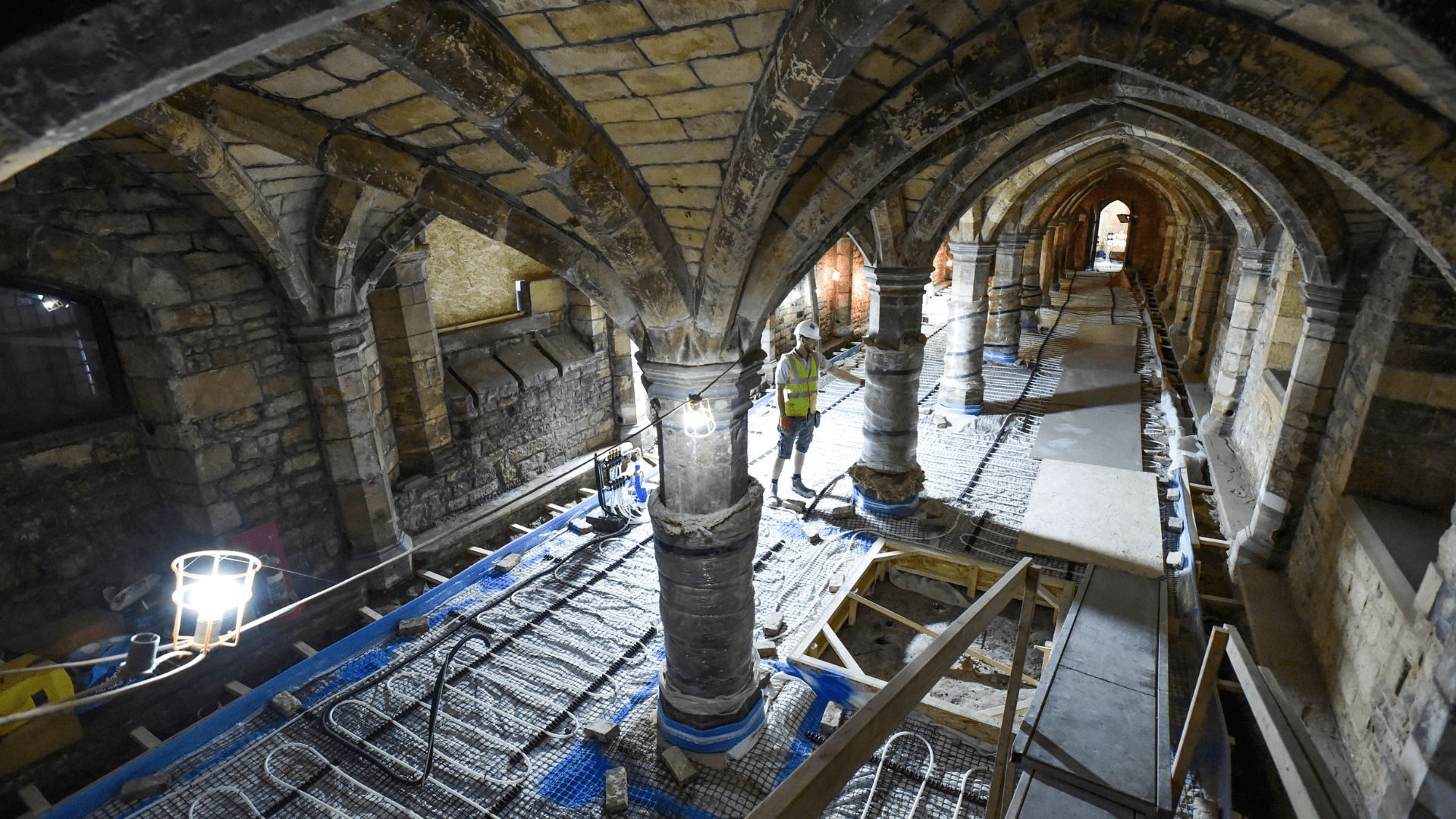 A shot from above of the under croft of Greyfriars with a floor being fitted out into the historic heritage site building
