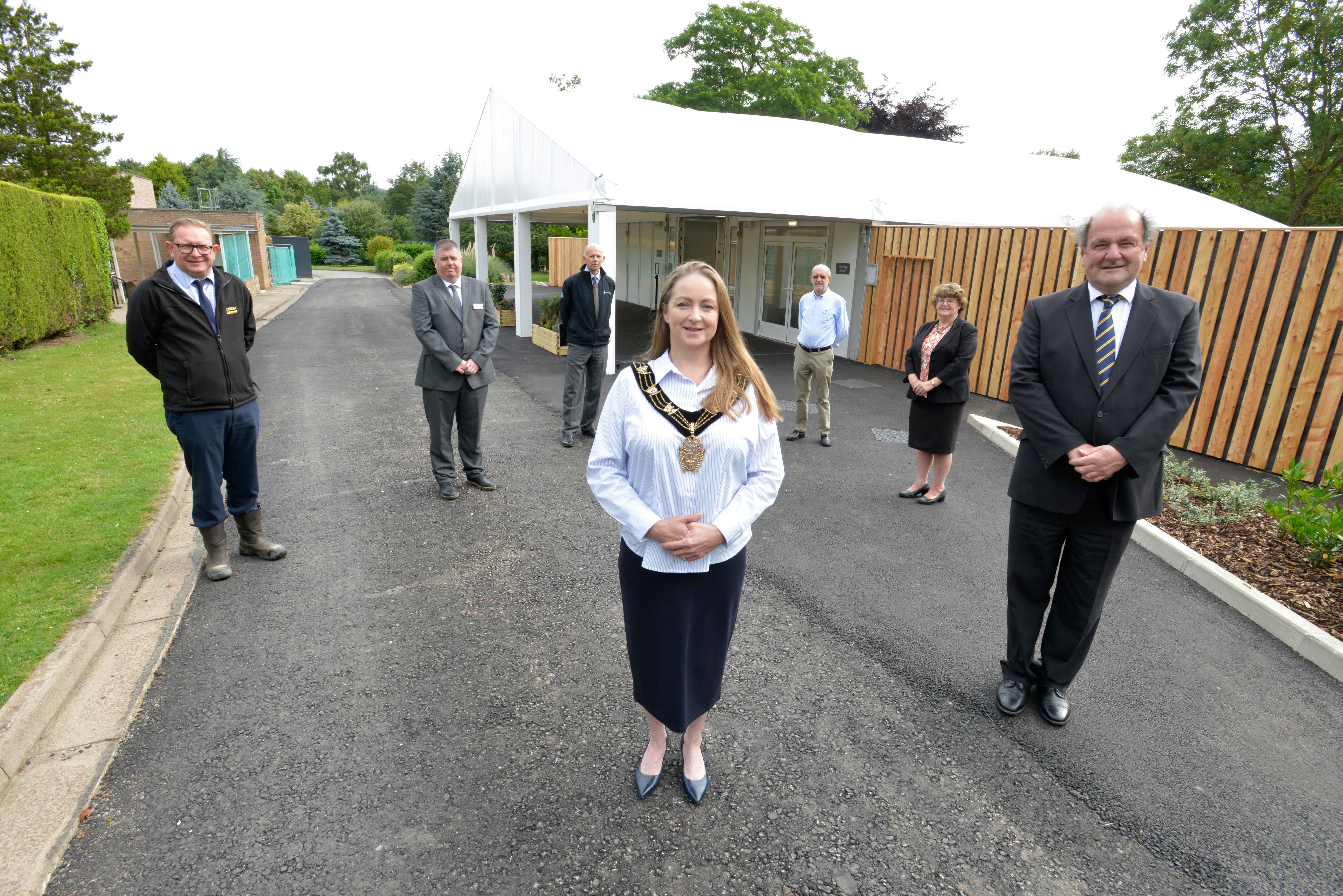 Members and staff outside new second chapel