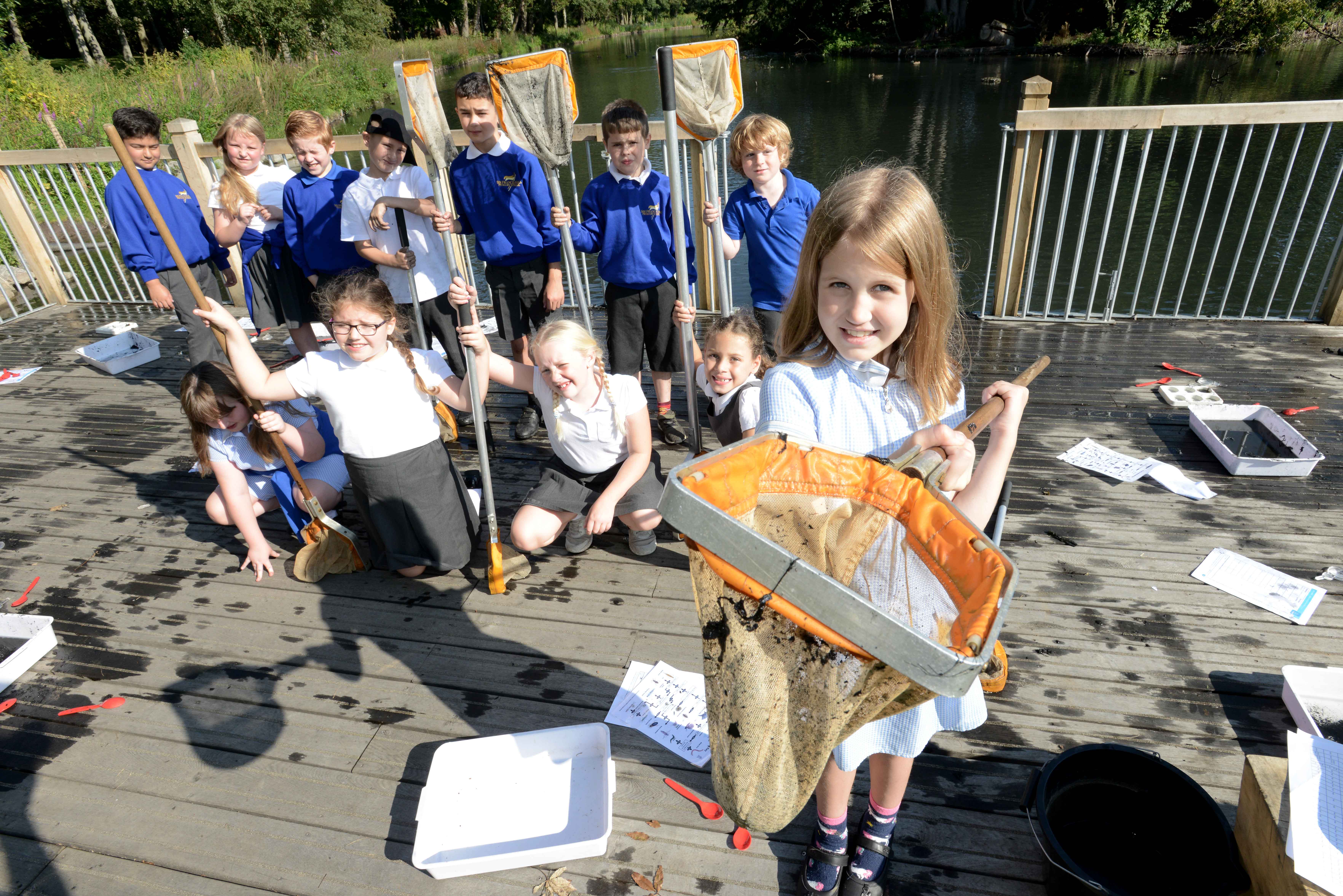 School children from Sir Francis Hill School pond dipping at Boultham Park Lake