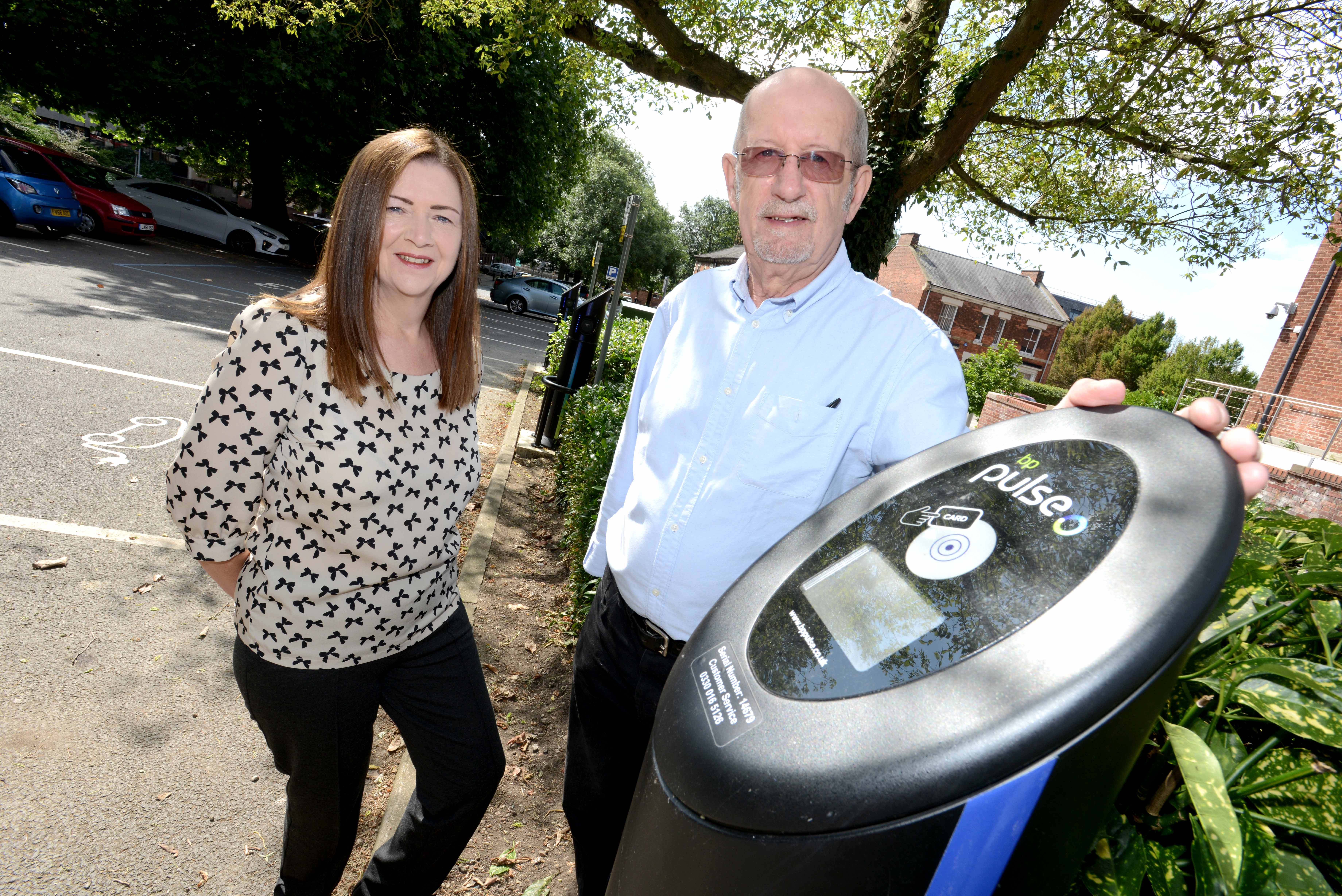 Lorraine Burrows and Cllr Bob Bushell at the City Hall EV Charging Points