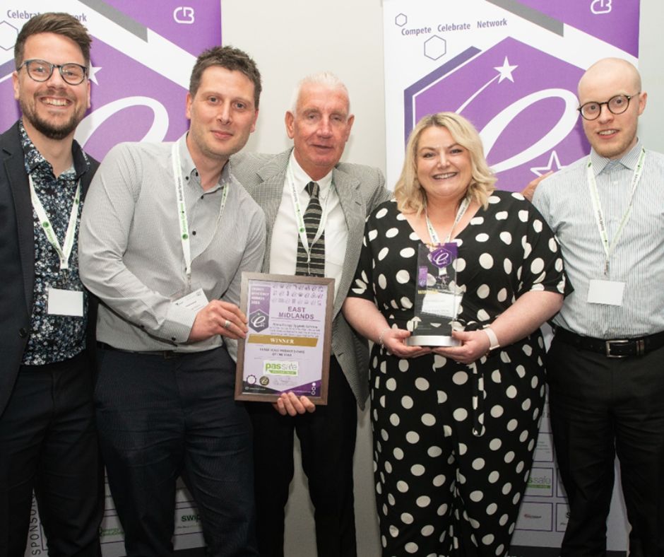 Image of YES energy solutions team and partners receiving their award.