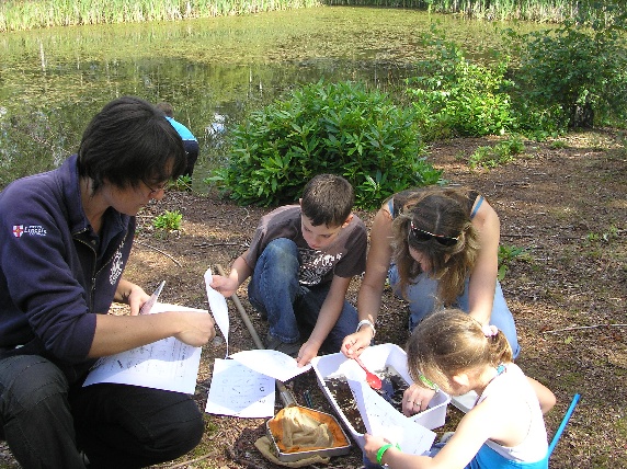 A photo of children on an educational visit to Hartsholme country park