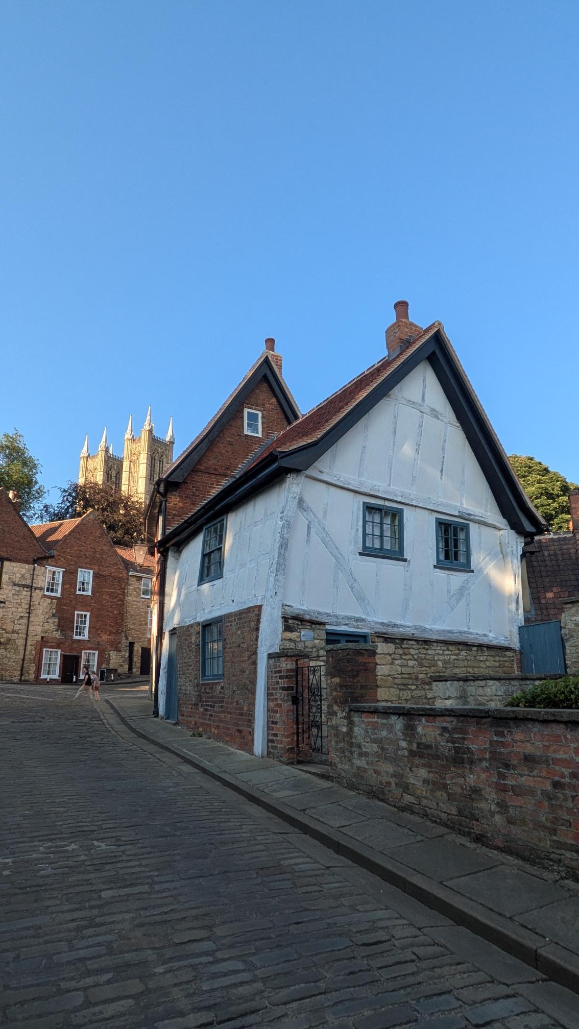 A grade II listed timber-framed building that leans to the right as you look up Michaelgate hill in Lincoln.